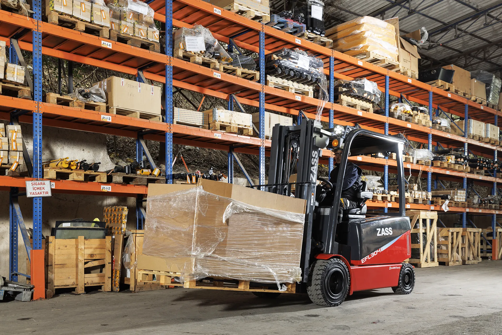 ZASS forklift moving a wrapped pallet